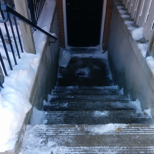 North Toronto Snow Services - snow shoveling a stairway in Chaplin Estates near Yonge & Eglinton